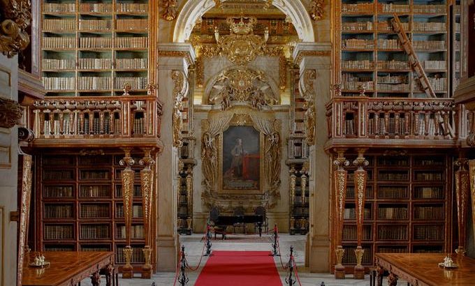 exterior of baroque library building with ornate front doorway